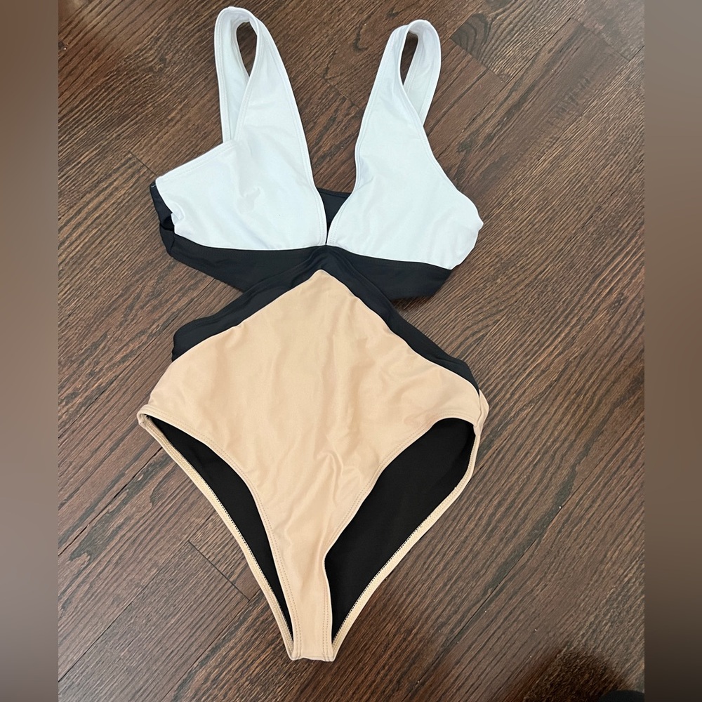 Brand new never worn one piece swim multi color black white tan